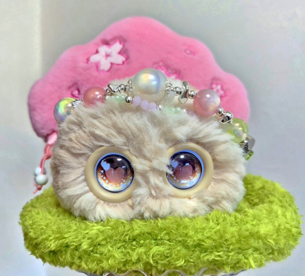 Beige Fuzozo in a flower chair